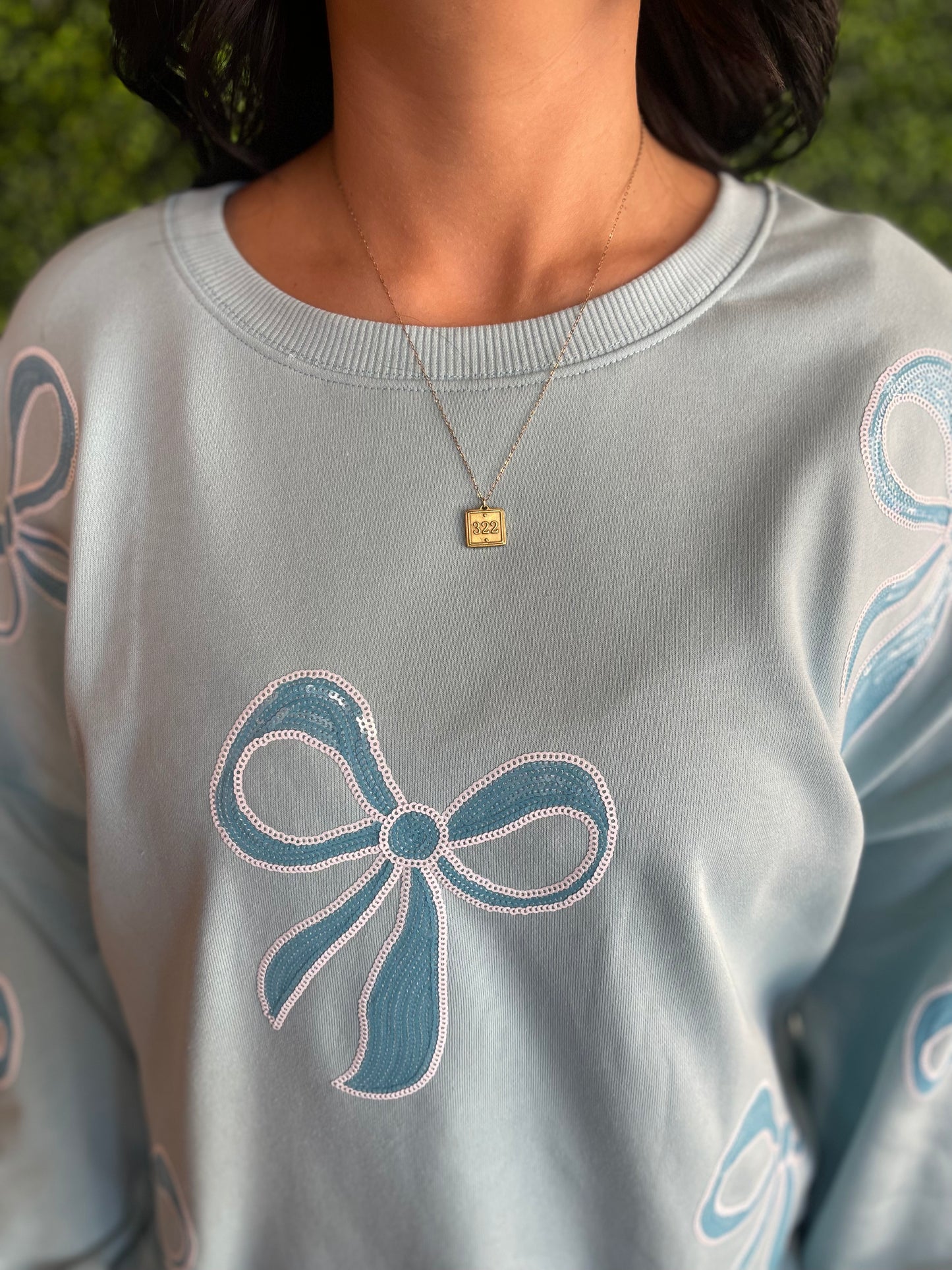 Blue Rhinestone Bow Pullover